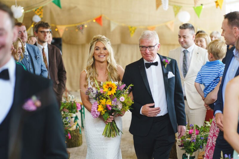 Bride and dad walking down the aisle