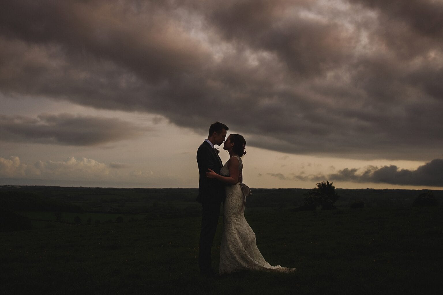 Moody sunset portrait bride and groon Coed Hills Rural Art Space